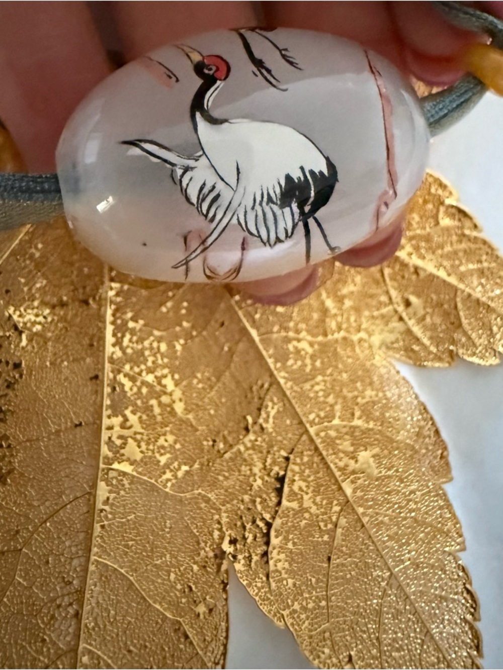Gold Leaf Ornament with Crane Bead Accent by Still Life - Picture 3 of 9